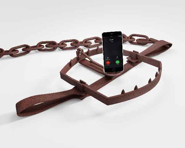 Distractions of mobile devices in a bear trap on white